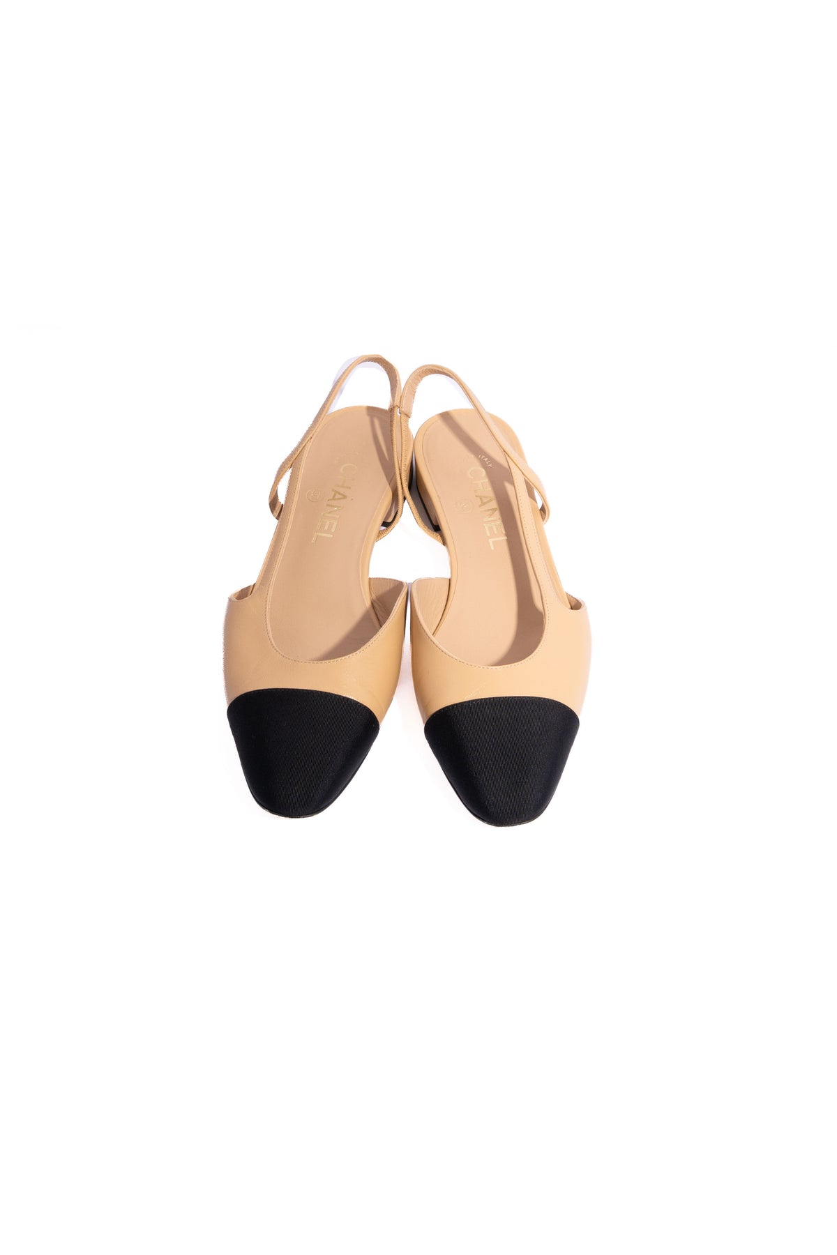CHANEL Beige/Black Goatskin Grosgrain Cap Toe Slingbacks | Sz 38.5