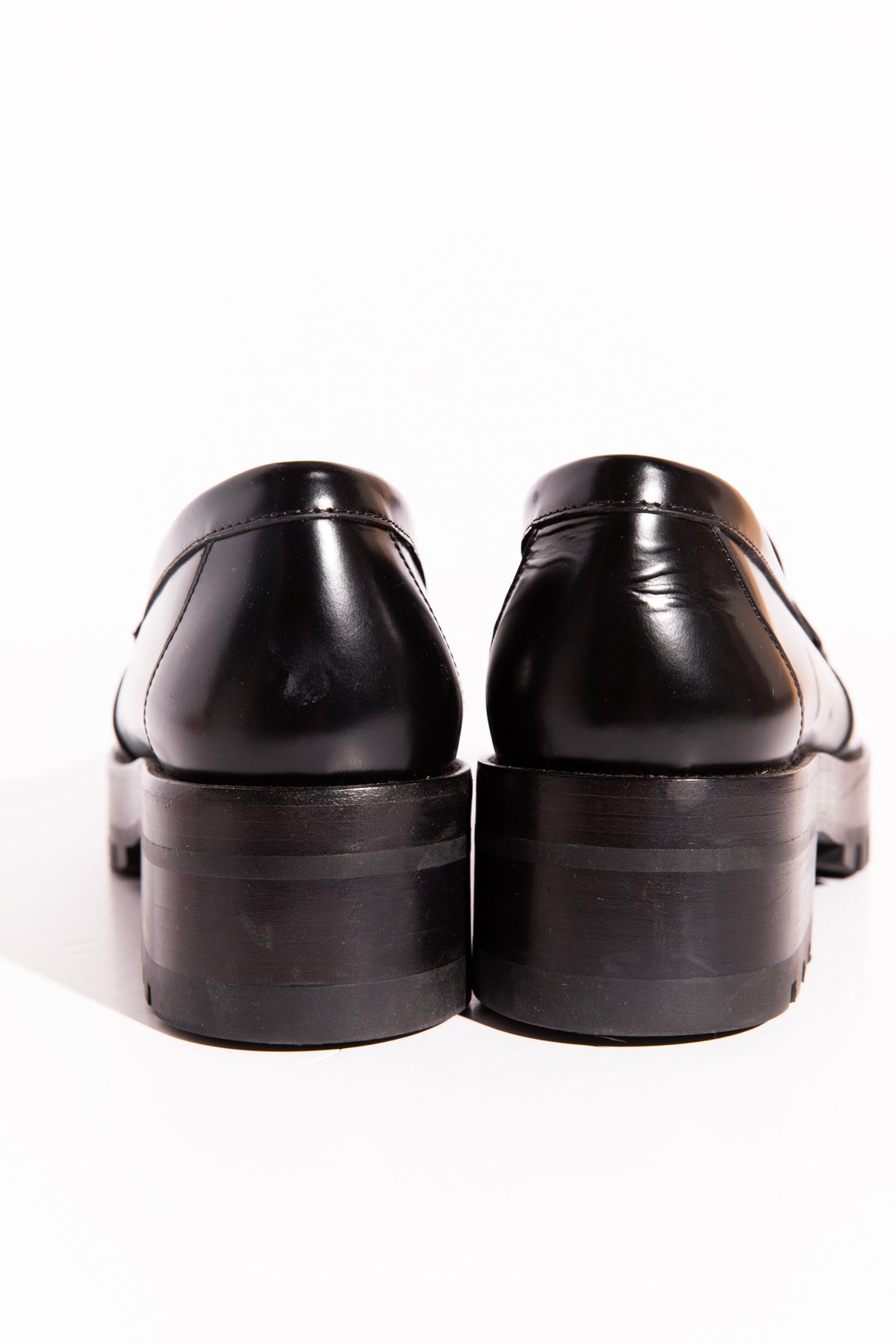 CHANEL Black Lug Sole CC Loafers (Sz.41)