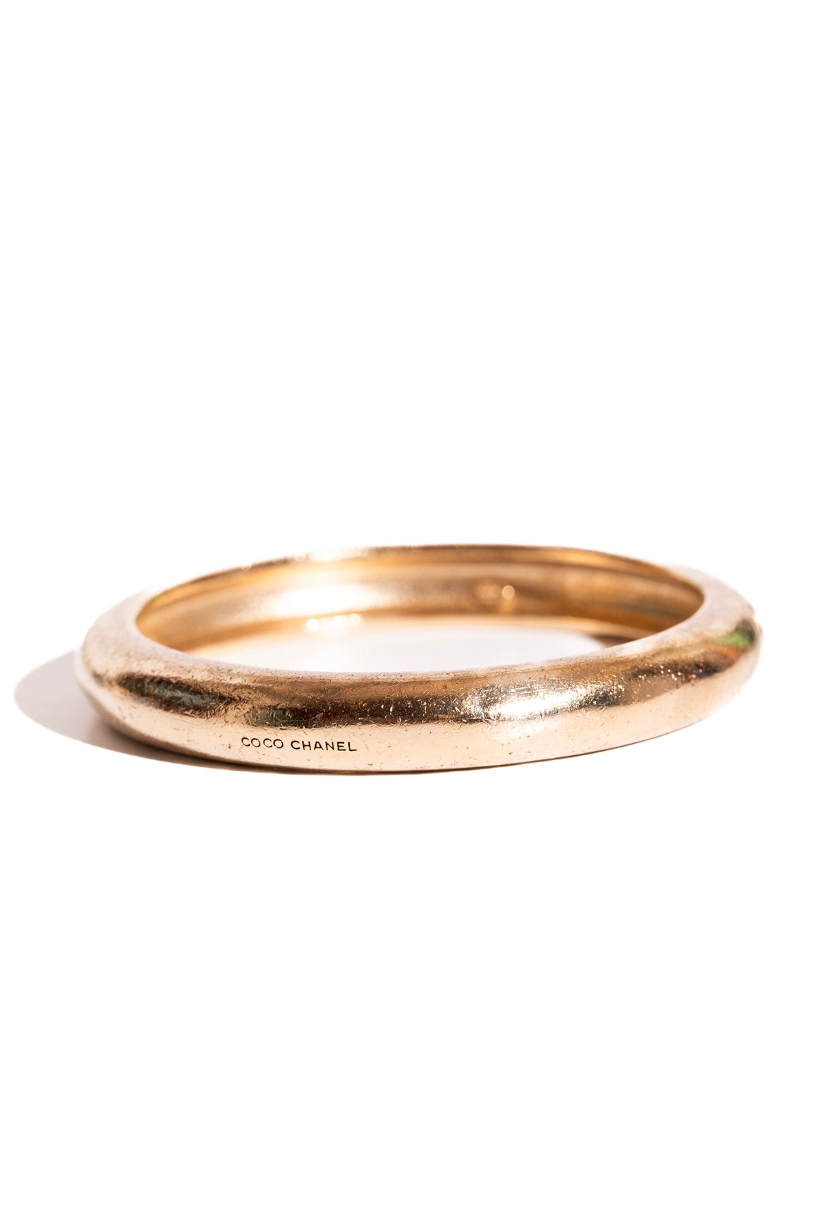 2007 CHANEL Gold French Saying Bangle
