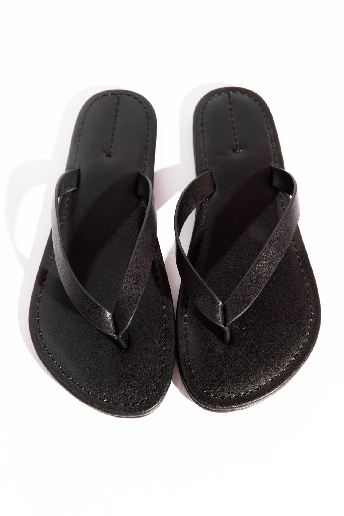 THE ROW Black Leather Flip Flops (Sz. 38)
