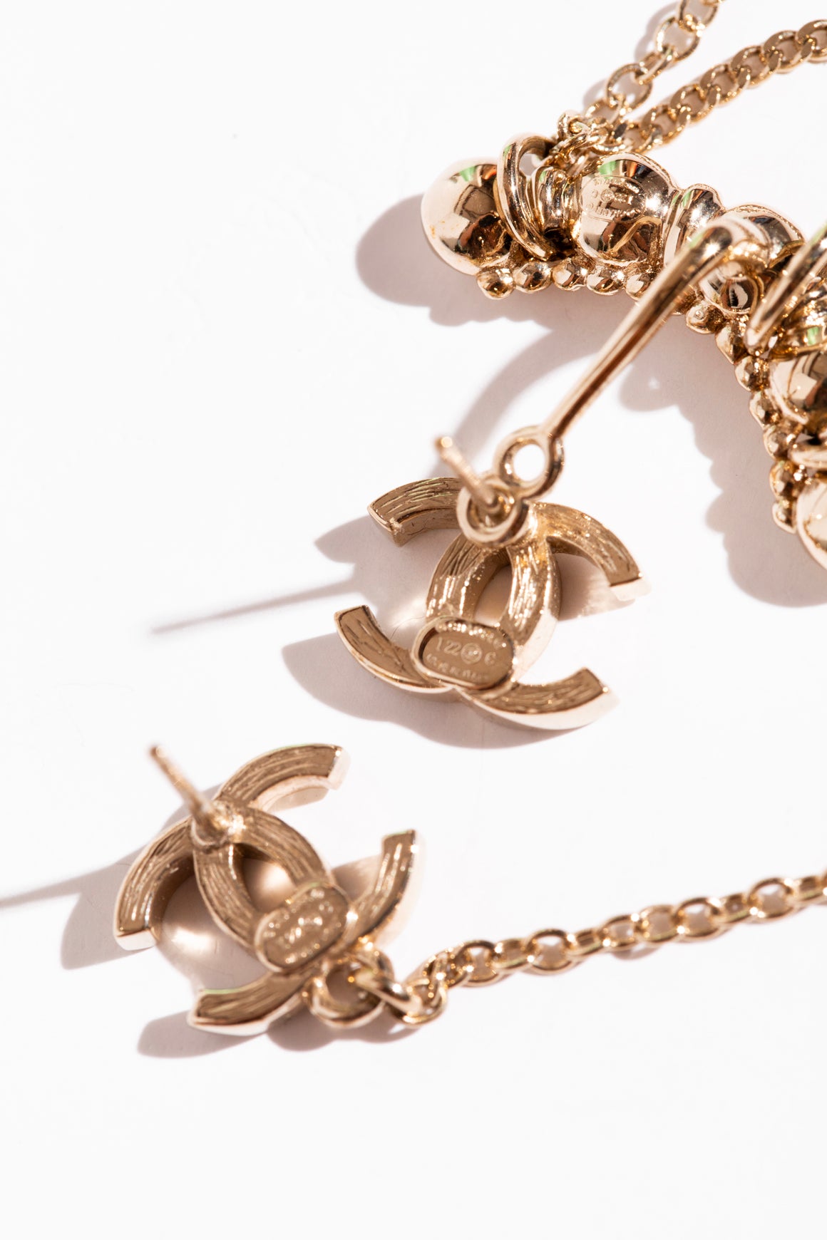 CHANEL Gold Crystal CC & Gold Chain Asymmetric Earrings