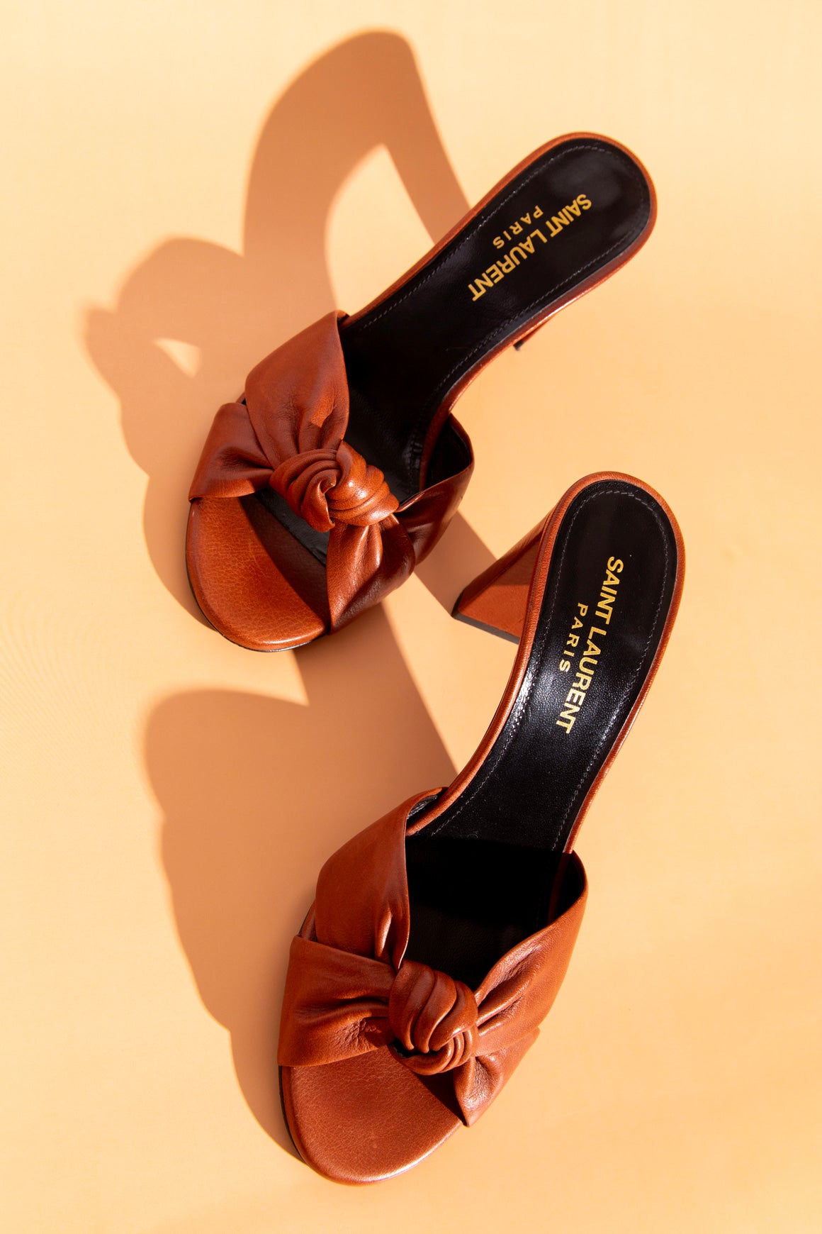 SAINT LAURENT Leather Knot Heeled Mules (Sz. 35.5)