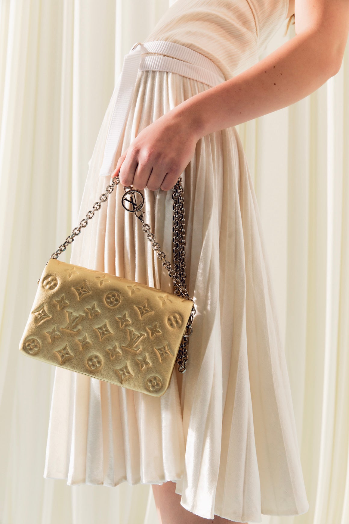 LOUIS VUITTON Gold Monogram Pochette Coussin