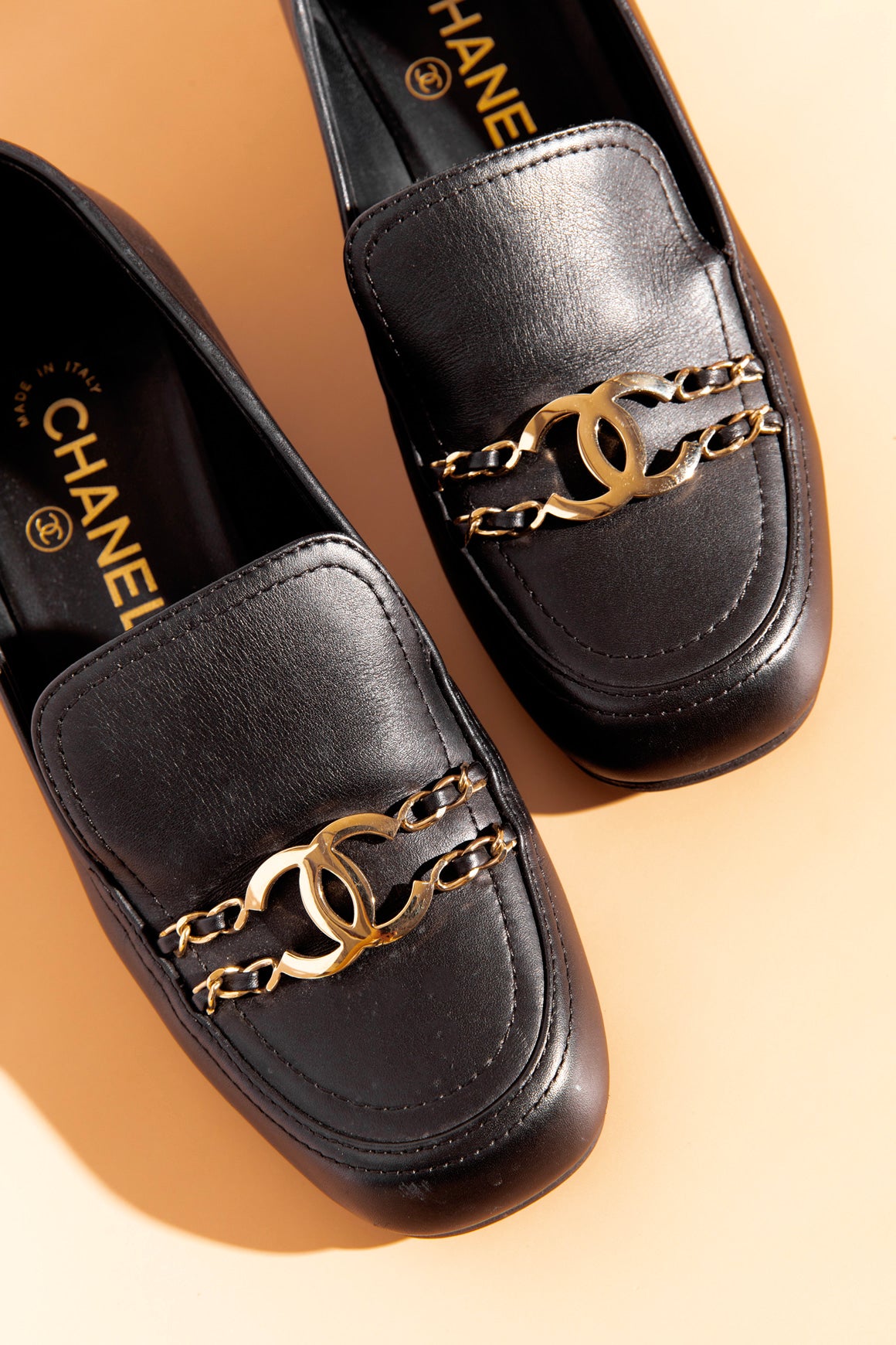 CHANEL Black Leather Gold CC Chain Loafers (Sz. 36.5)