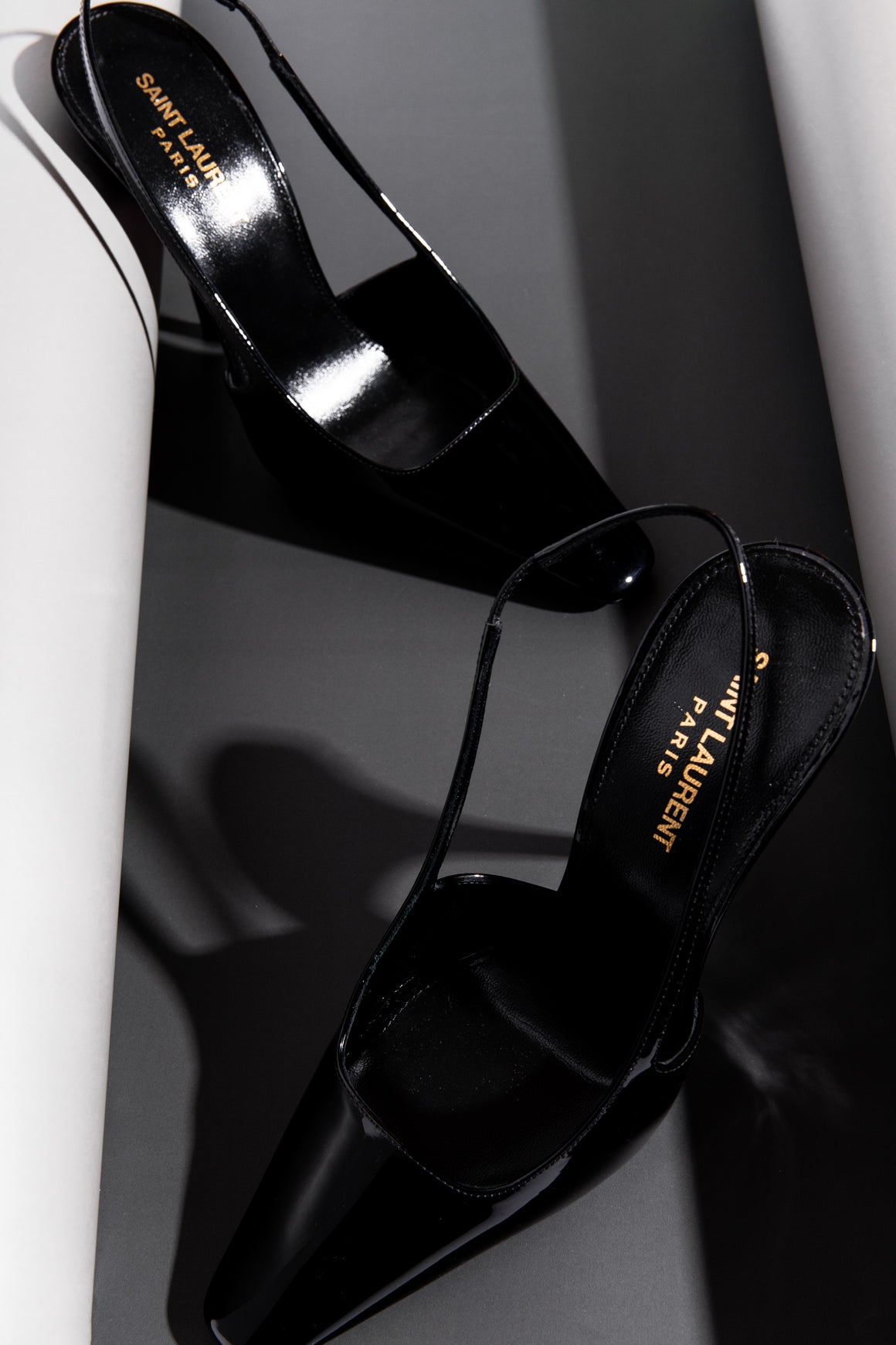 SAINT LAURENT Black Patent Leather Slingback Pumps (Sz. 37.5)