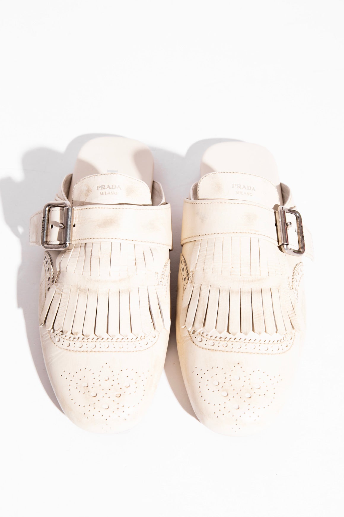 PRADA Cream Shuffle Fringed Kiltie Mule (Sz. 40)