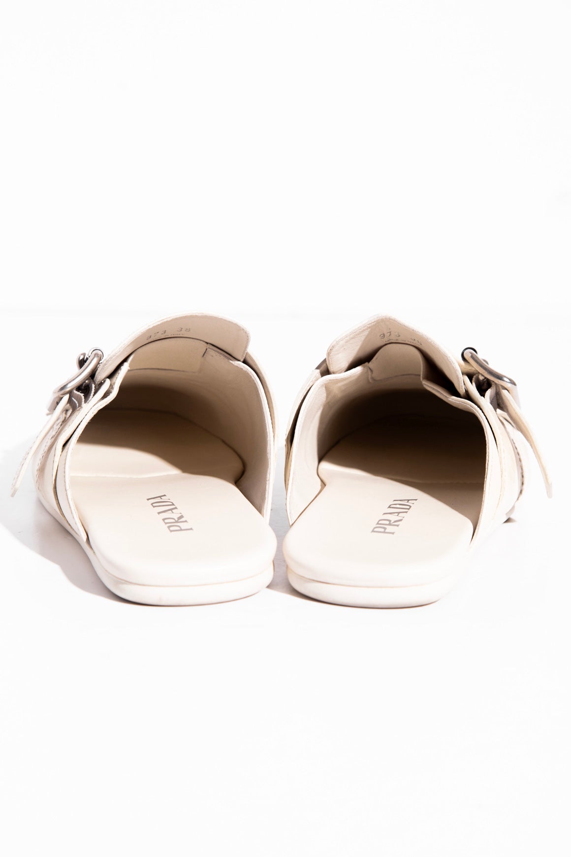PRADA Cream Shuffle Fringed Kiltie Mule (Sz. 40)