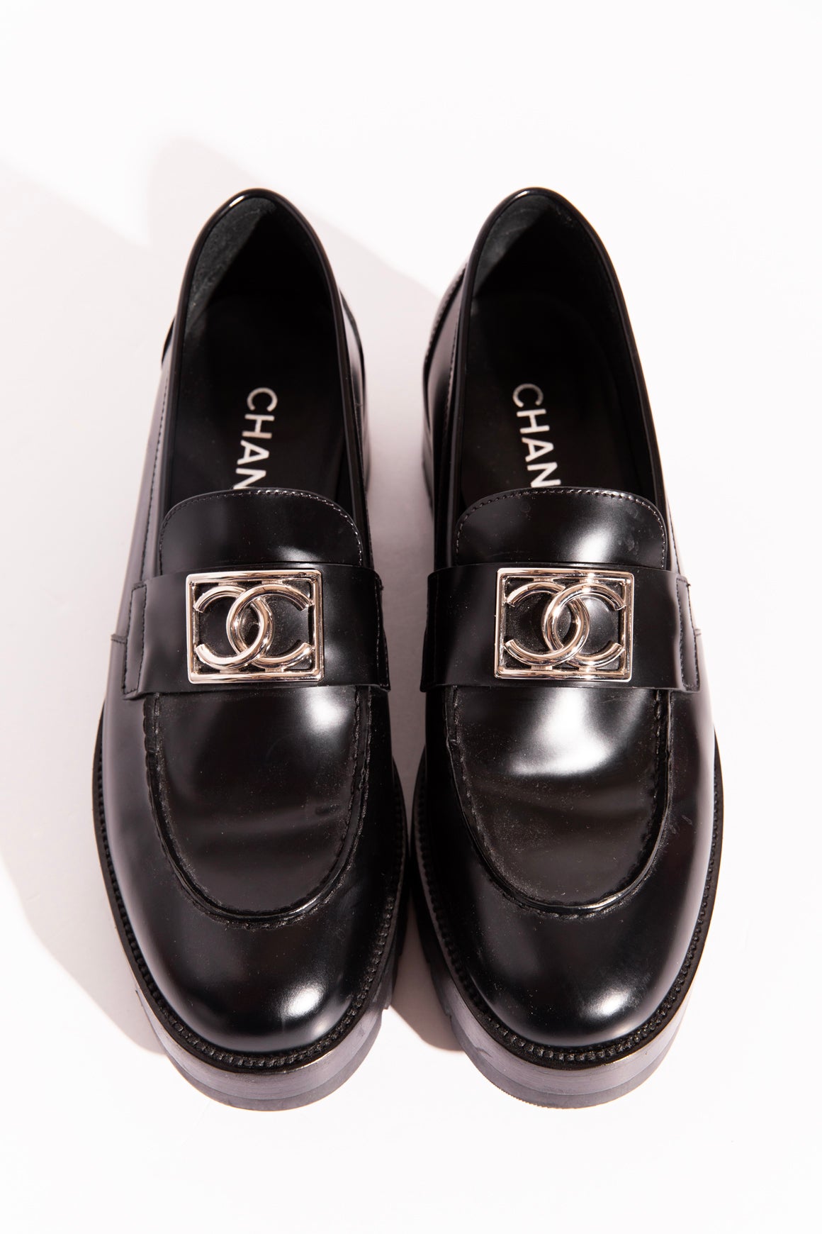 CHANEL Black Lug Sole CC Loafers (Sz.41)