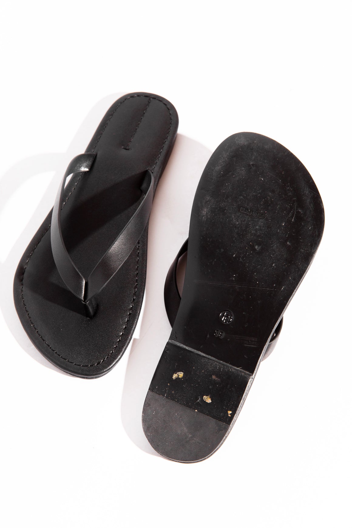 THE ROW Black Leather Flip Flops (Sz. 38)