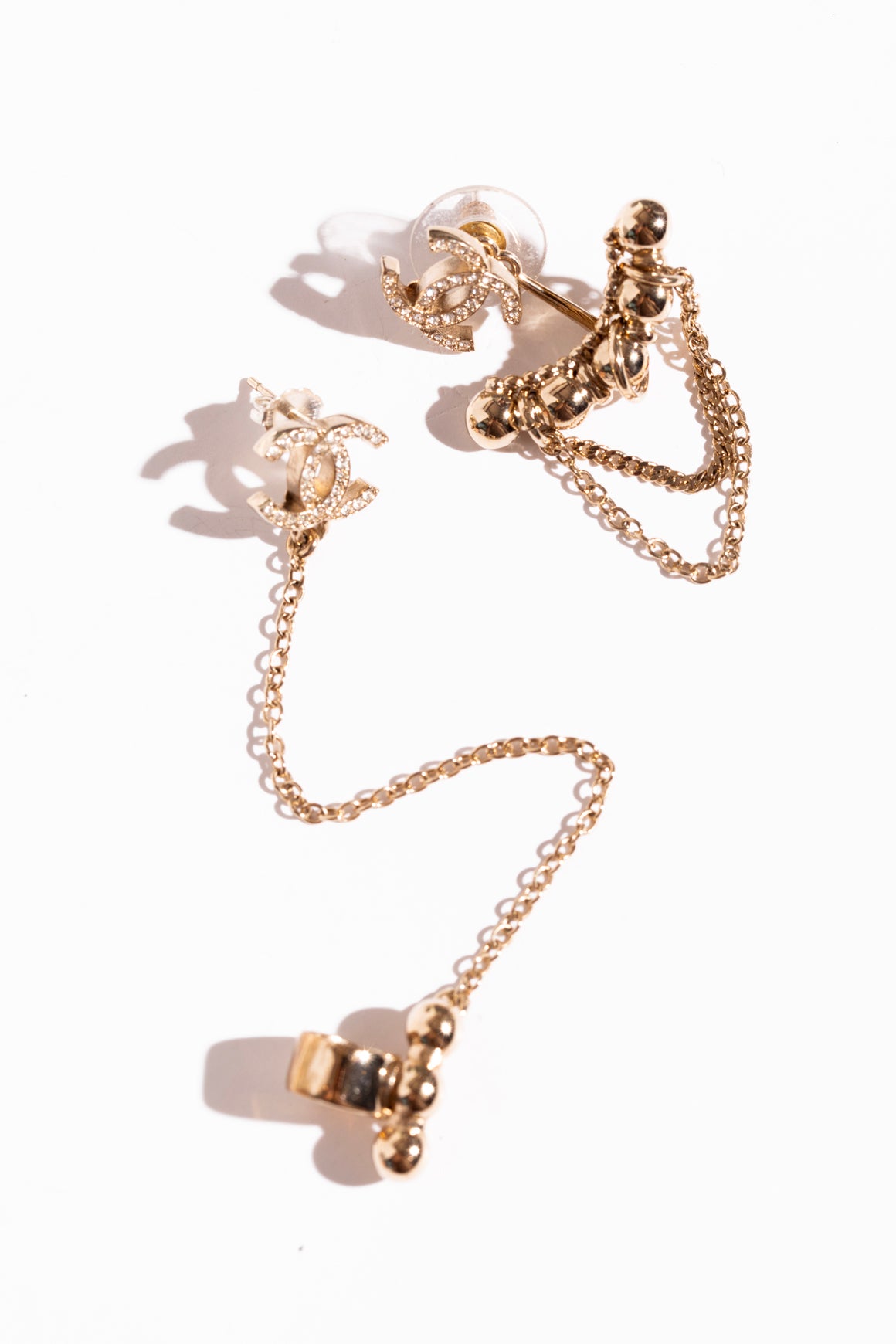 CHANEL Gold Crystal CC & Gold Chain Asymmetric Earrings