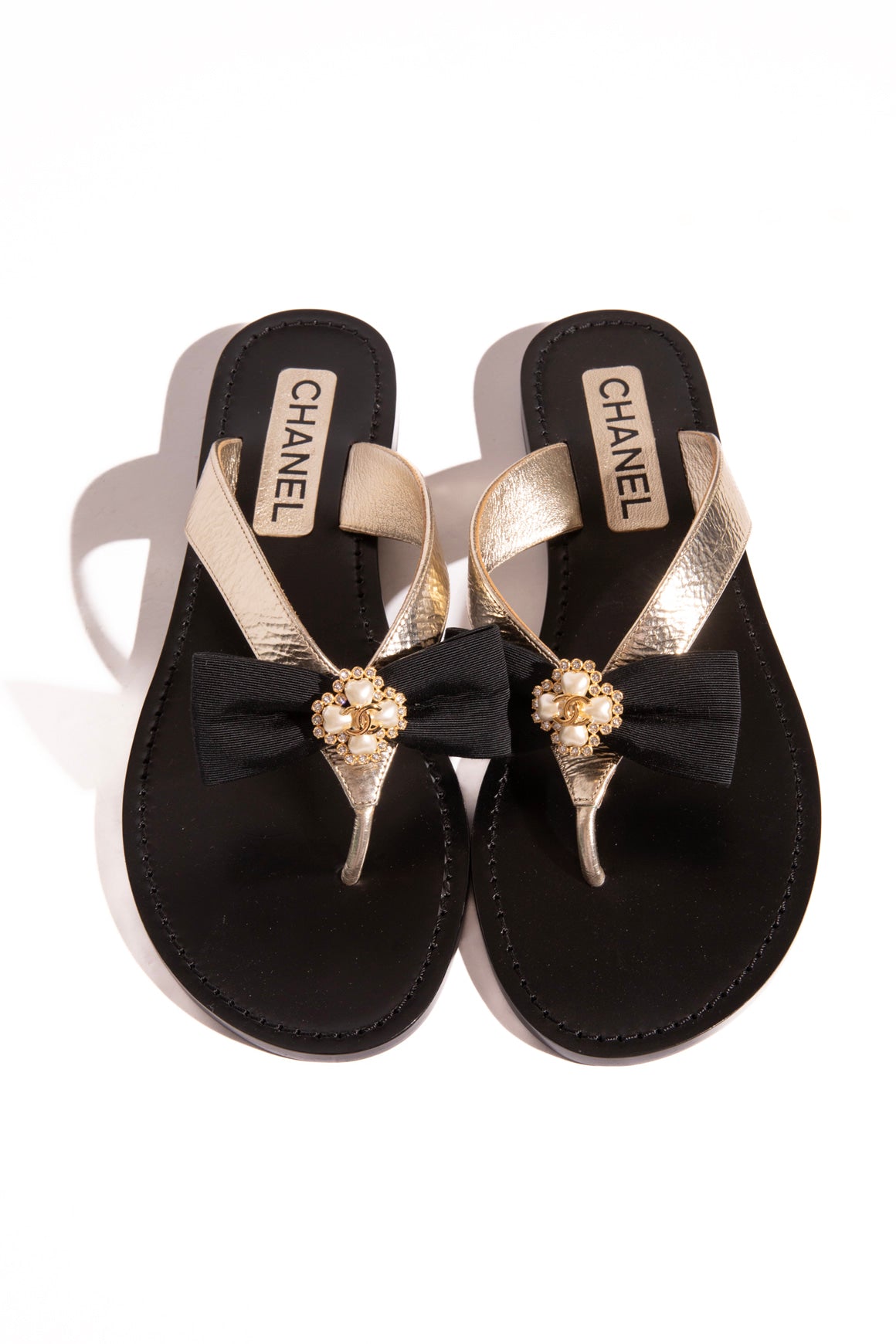 CHANEL Black & Gold Bow & Pearl Flip Flops (Sz. 38.5)