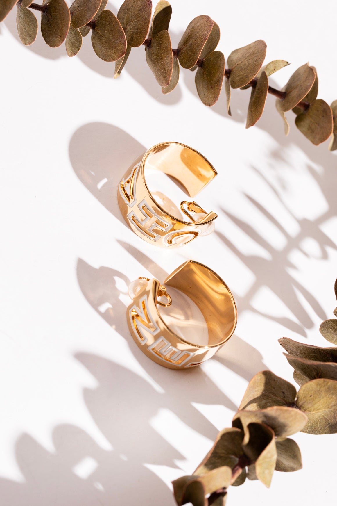 CHANEL Gold Tone + White 'Cha' 'Nel' Hoops