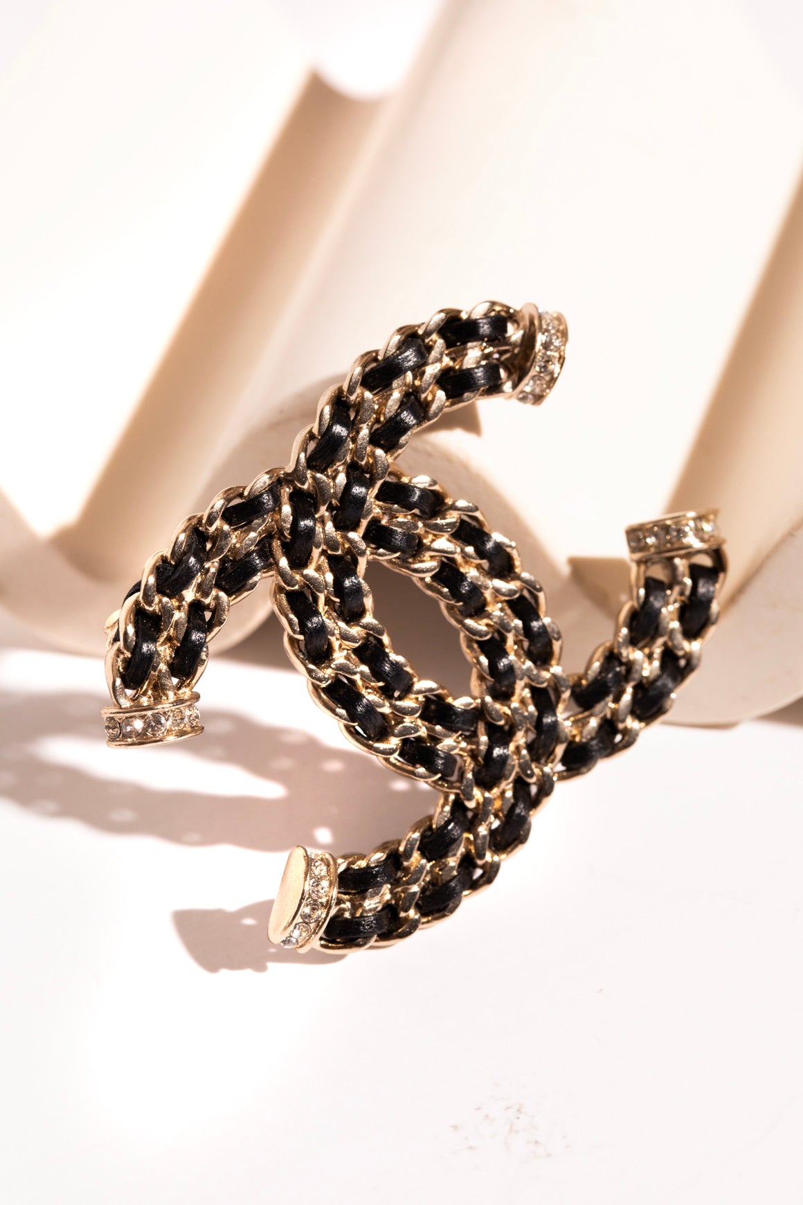 CHANEL Black & Gold Braided CC Brooch