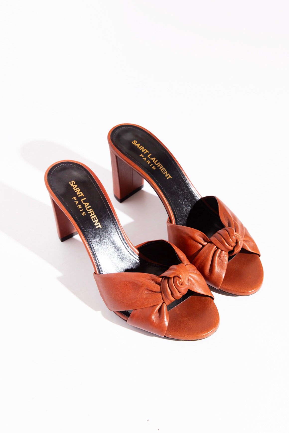 SAINT LAURENT Leather Knot Heeled Mules (Sz. 35.5)