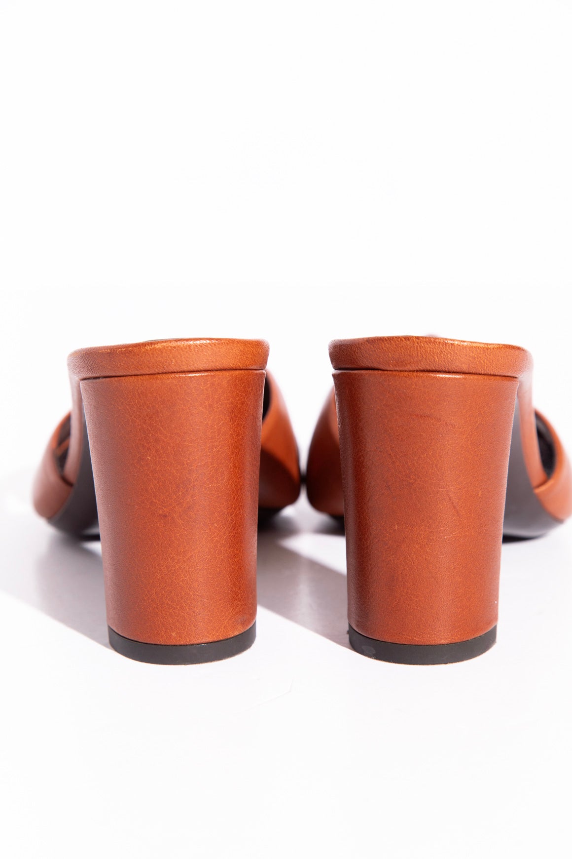 SAINT LAURENT Leather Knot Heeled Mules (Sz. 35.5)