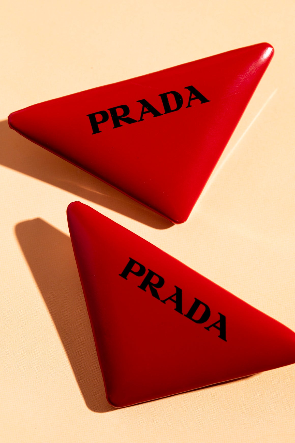 PRADA Red Tringle Logo Brooch